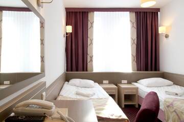 Фото номера Двухместный номер с 2 отдельными кроватями Отель Hotel Arche г. Седльце 4