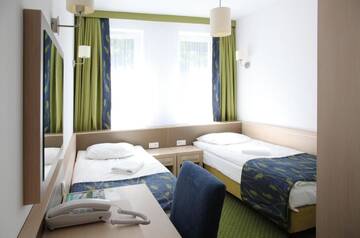 Фото номера Двухместный номер с 2 отдельными кроватями Отель Hotel Arche г. Седльце 5