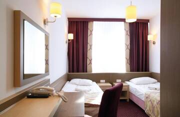 Фото номера Двухместный номер с 2 отдельными кроватями Отель Hotel Arche г. Седльце 6